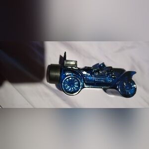 Sleek Blue and Black Vintage-Style Toy Race Car